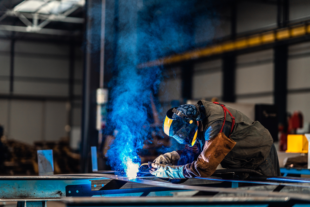 Professional,welder,with,protection,mask